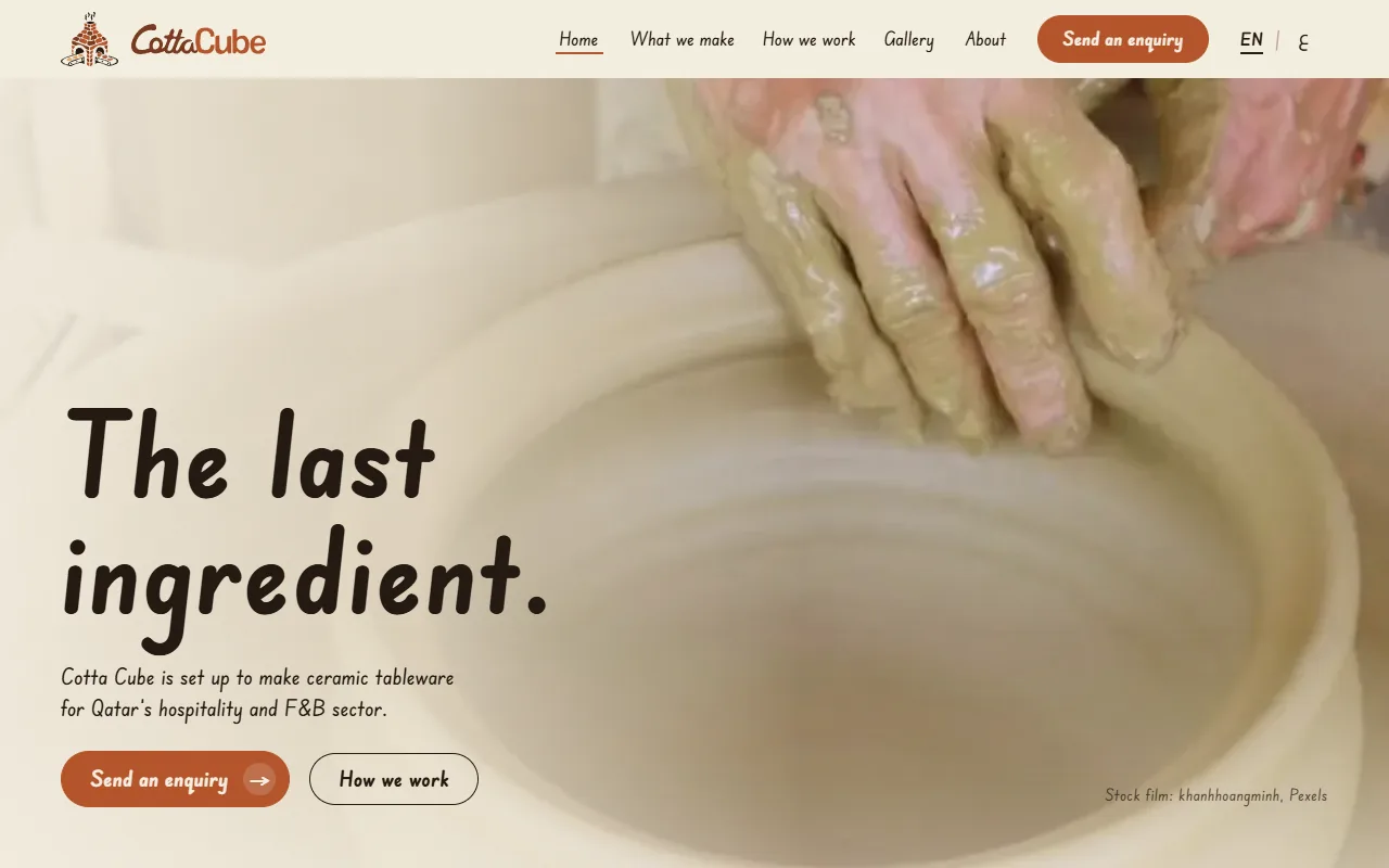 The Cotta Cube website on a desktop screen: a potter’s hands shaping clay on a wheel, with the headline The last ingredient.